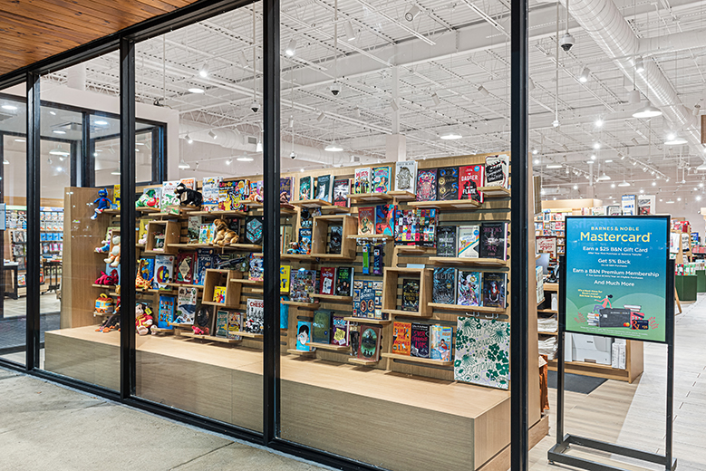 Barnes & Noble storefront window featuring our a custom, modular shelving display.